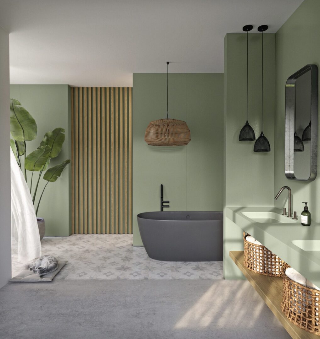 A bathroom with green walls and white tile floors.