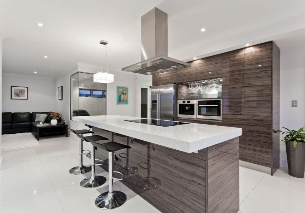 A kitchen with a stove, oven and microwave.